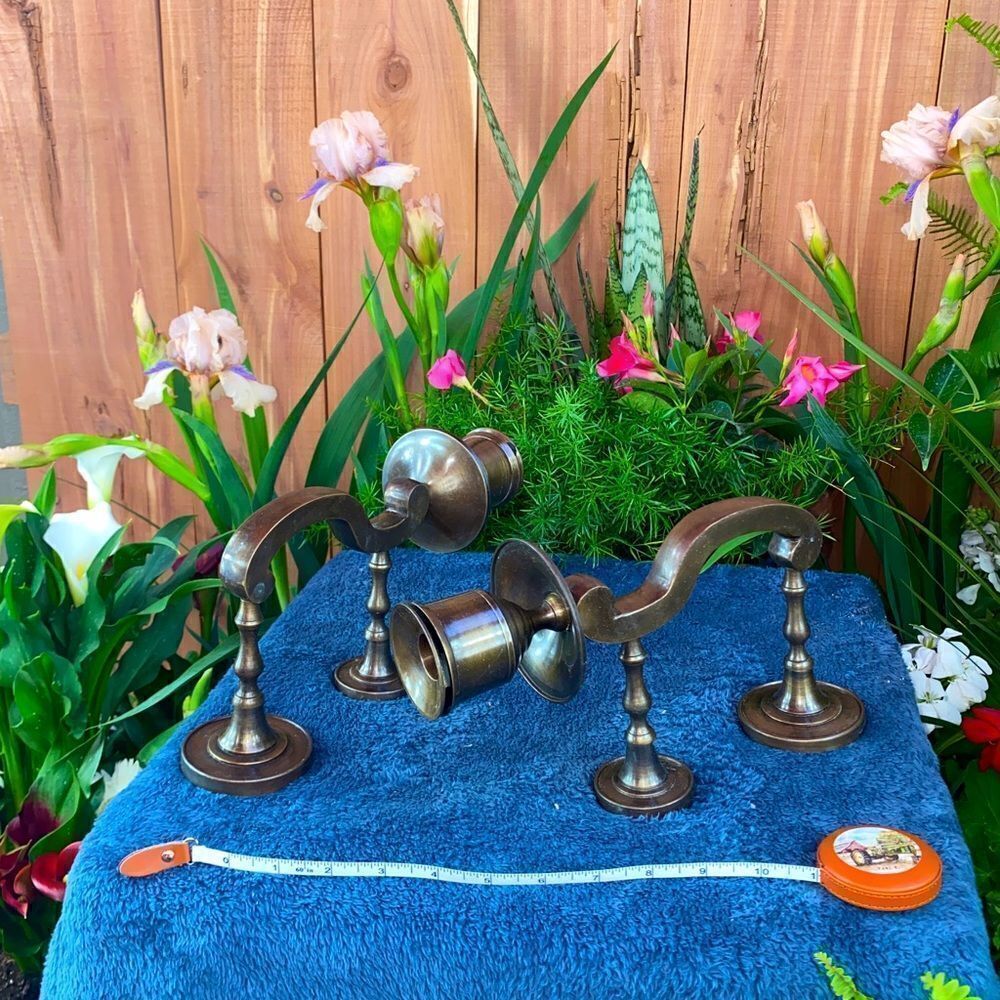 Pair of solid brass wall mount candle holders